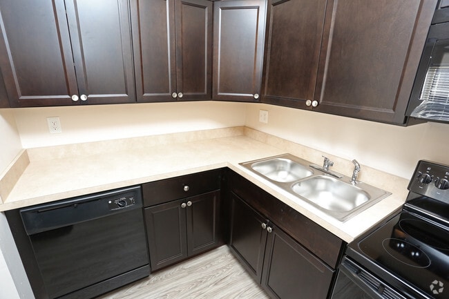 2BR, 1BA - 800 SF - Kitchen *dishwasher & microwave in select units only - Chateau Royale Apartments