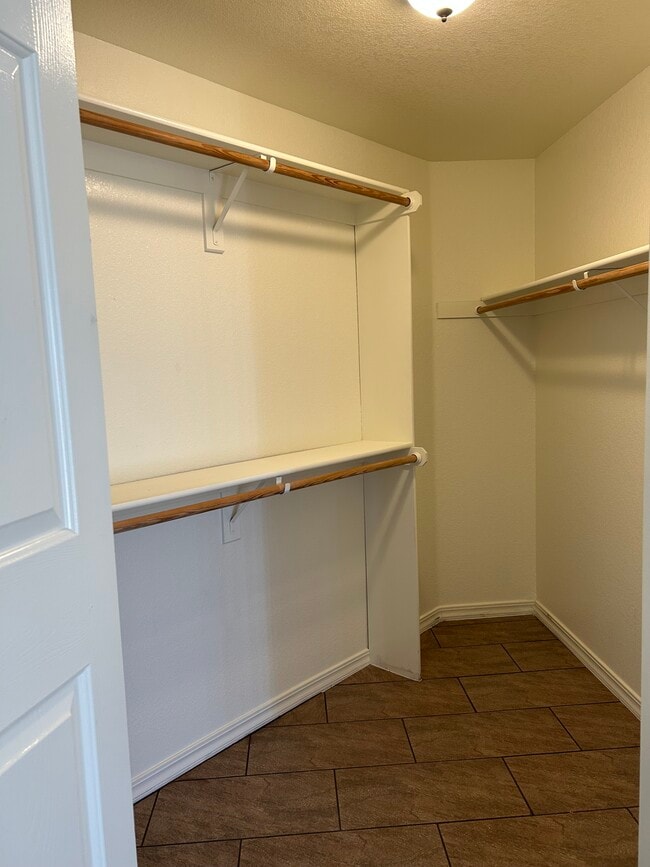 Master bedroom walk-in closet - 10733 Garibaldi Dr