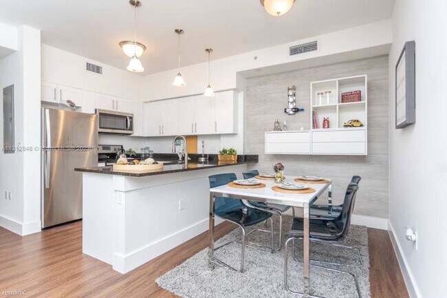 Building Photo - 2 br, 2 bath Condo - 25011 SW 130th Ave # 2BD