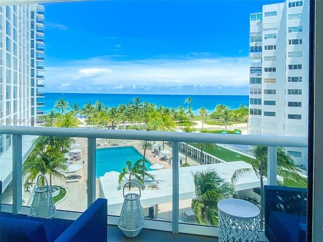 Building Photo - 10275 Collins Ave