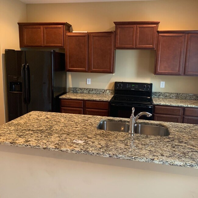Foto del edificio - Townhome Condo