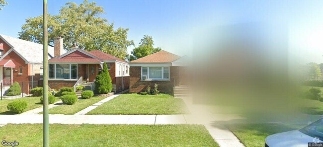 Building Photo - 7249 S Sawyer Ave