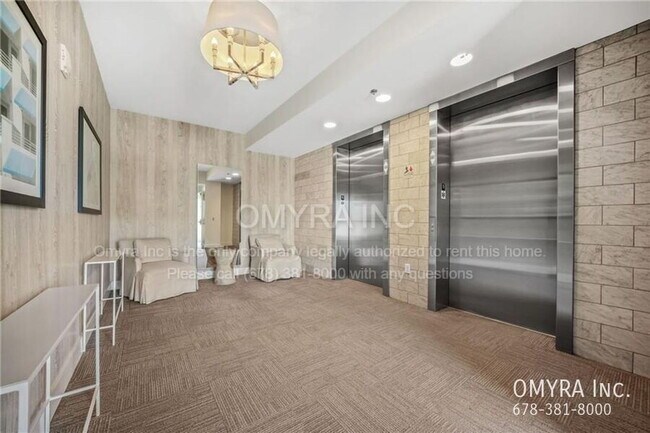 Foto del edificio - Stunning 3-Bedroom Midtown Condo with City...