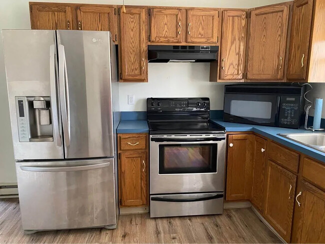 Kitchen with stainless steel appliances - 2340 Lexington Ave