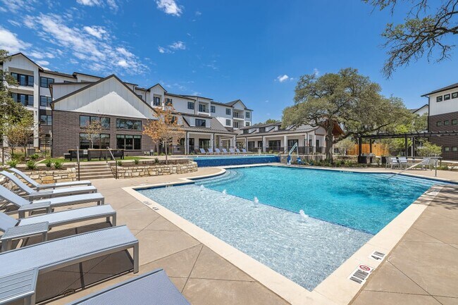 Building Photo - Opulent Escapes: Luxury Apartments for the...