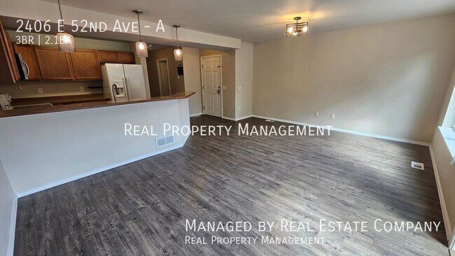 Building Photo - 2406 E 52nd Ave