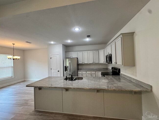 Building Photo - 5723 Maggie Rose Cir