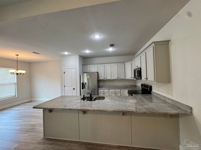 Foto del edificio - 5723 Maggie Rose Cir