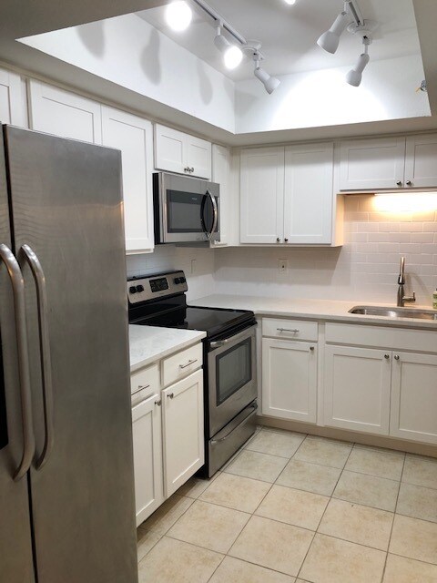Kitchen - brand new cabinets and appliances - 1801 E Lake Rd