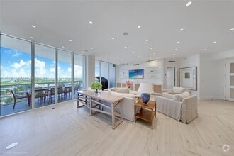 Building Photo - 10225 Collins Ave
