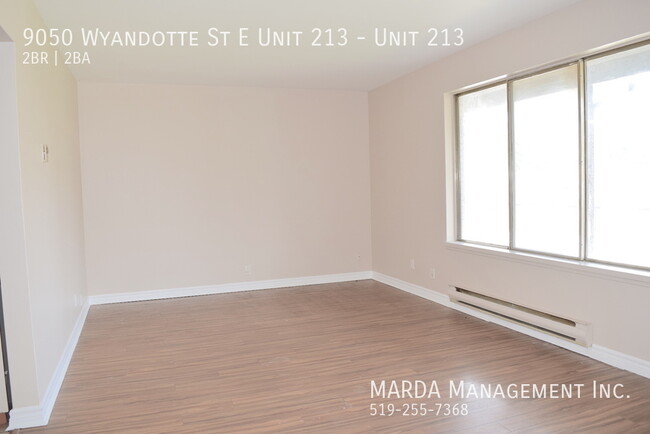 Building Photo - BRIGHT AND SPACIOUS 2BEDROOM/1BATH APARTME...