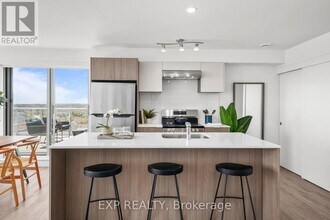 Building Photo - 100-100 Manett Crescent