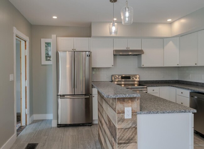 Foto del edificio - Beatiful 4 Bed Downtown Bath House