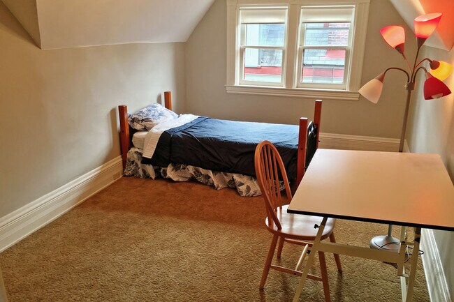 Medium Bedroom - 827 N. Highland Ave. Apartments