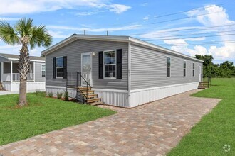 Building Photo - 6671 Hidden Oaks Dr