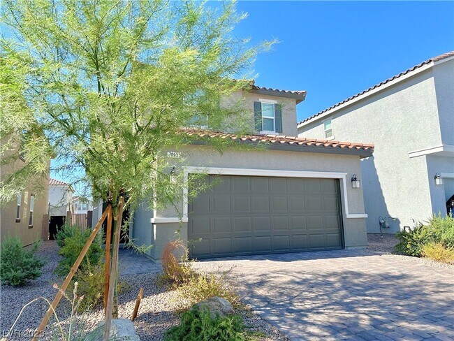 Building Photo - 7663 Lush Oasis Ave.
