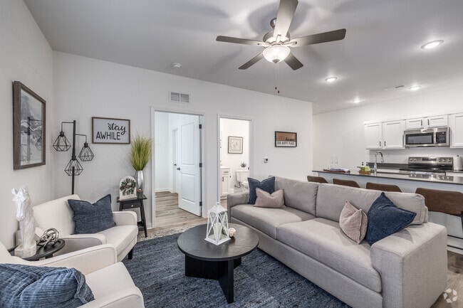 2BR, 2BA - 1,016SF - Living Room - Gated Villa Apartments at Kearney