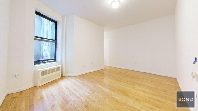 Foto del edificio - 411 E 70th St
