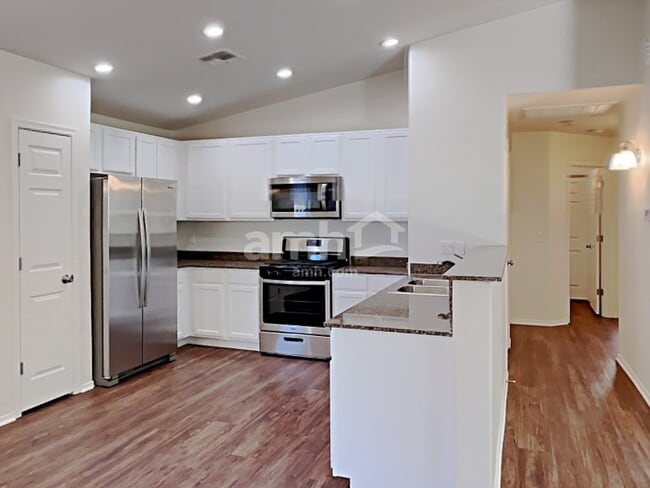 Foto del edificio - 12427 N Floating Feather Ln