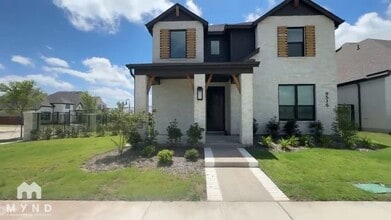 Building Photo - 9516 Dahlia Blvd