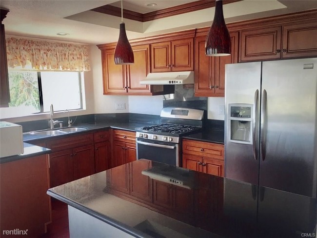 Building Photo - 4 br, 3 bath House - 3001 La Paz Ln Unit A