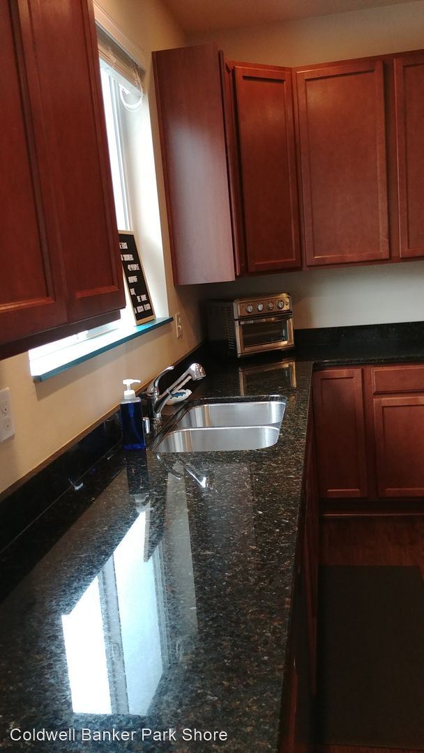 Foto del edificio - 5 br, 2.5 bath House - 21811 Windmill Loop NW