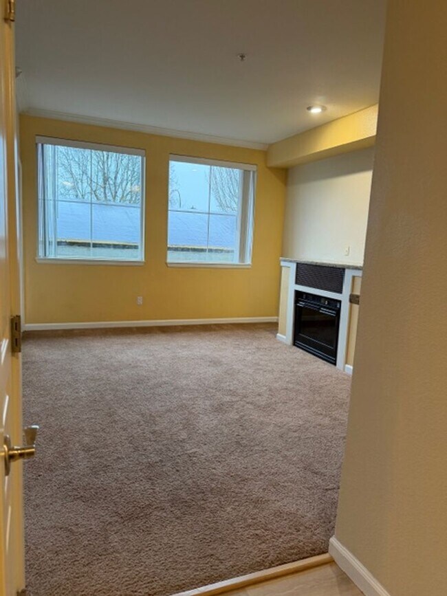 Building Photo - Luxury Living in Downtown Renton! Studio Condo Available Now!