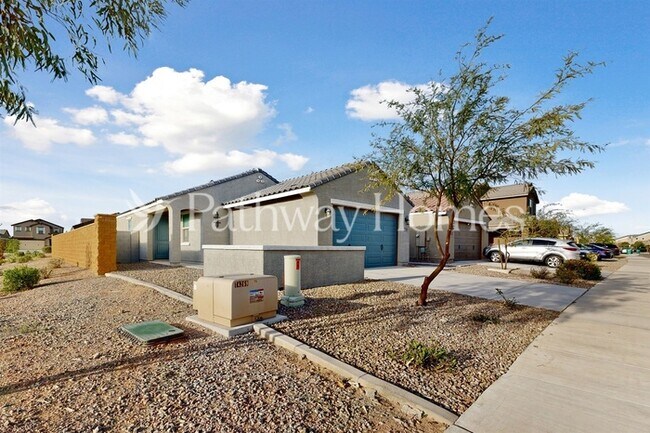 Building Photo - 40369 W Hillman Dr