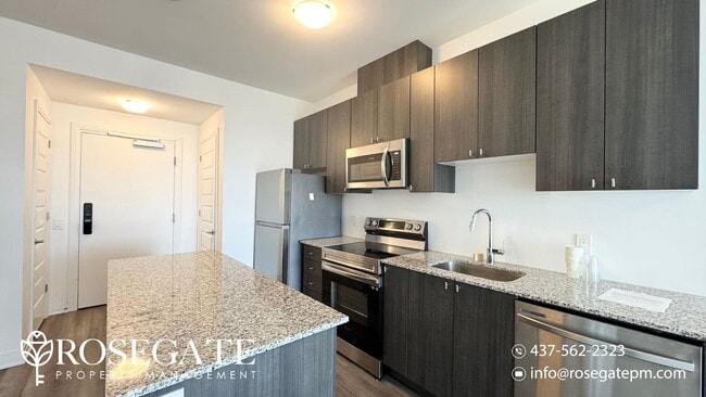 Building Photo - Modern 1+Den Condo in Milton – 695 Sq Ft w...