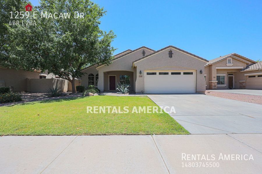 This 4 bed / 2 bath home in Gilbert wont l... House for Rent in