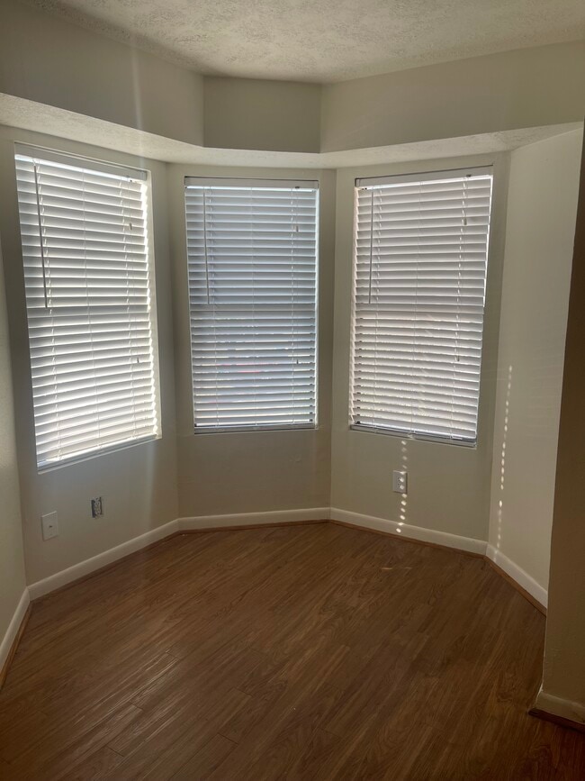 Bay window in living room - 4441 Old College Rd
