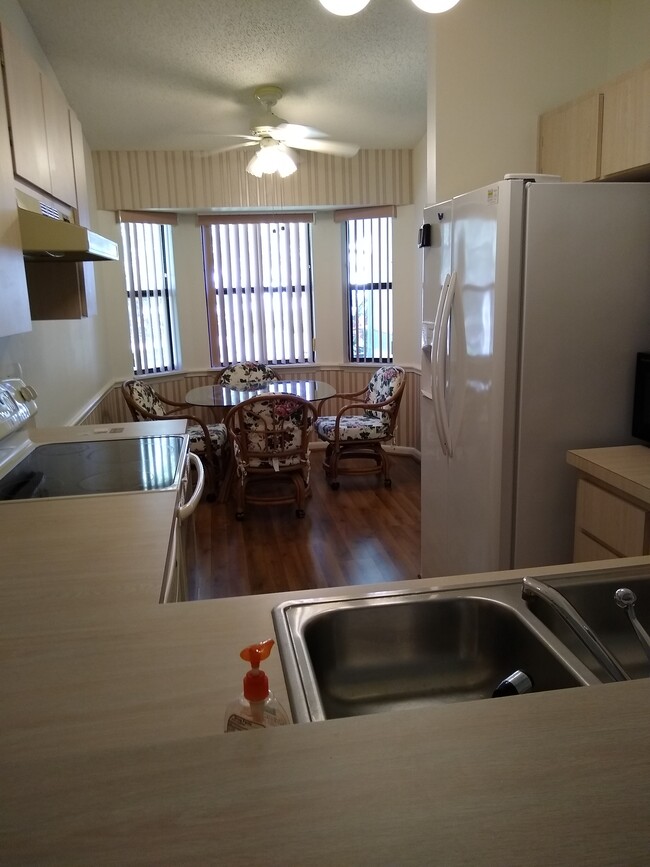 Kitchen with Breakfast Nook - 659 Whispering Pines Blvd