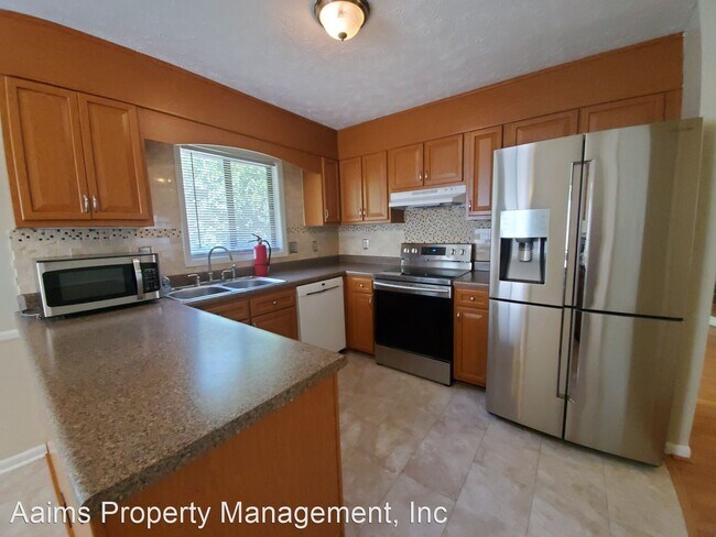Building Photo - 3 br, 2 bath House - 6400 Hollyhock Court