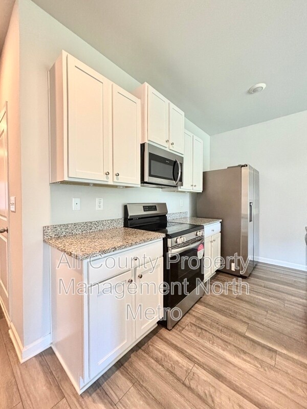 Building Photo - 305 Rolling Grn Dr