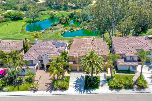 Aerial View of Home and lakes and golf course - 1655 Calliandra Rd
