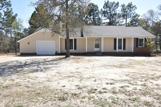 Building Photo - 6901 Woodmark Dr
