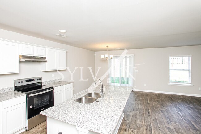 Building Photo - Stunning 4-bedroom, 2.5-bath move in ready...