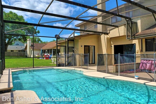 Building Photo - 4 br, 3 bath House - 817 Swaying Palm Dr