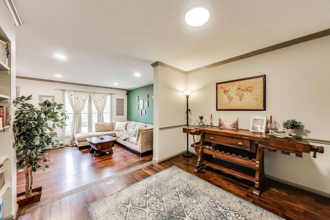 Building Photo - COMINGS SOON - Beautifully Updated Winchester-Built Townhome Backing to Serene Parkland.