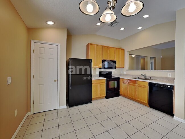 Foto del edificio - 11912 Mango Groves Blvd
