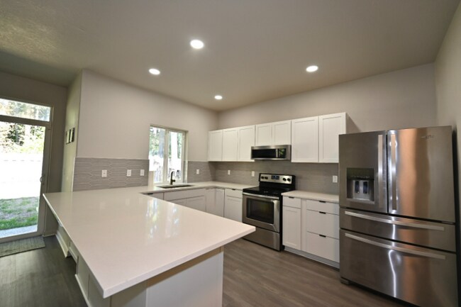 Building Photo - 5659 NE Canard Dr