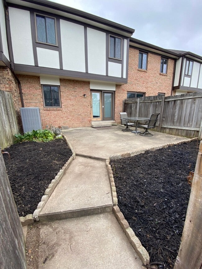 Private patio and back entrance - 9416 Haddington Ct