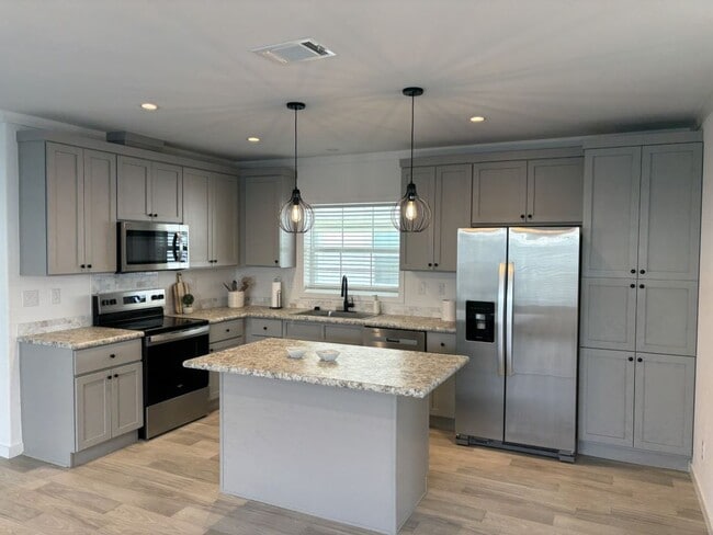 Building Photo - 5646 Blue Harbor Dr
