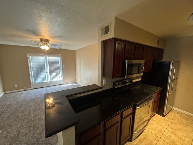 Building Photo - 2 Bedroom - 2 Bath 920 Sq. Ft. Condo in Be...