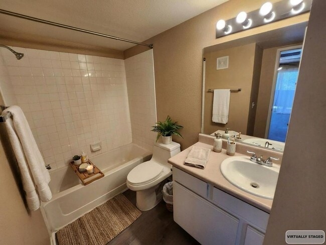 Building Photo - Centrally Located 2BD/2BTH Gated Condo With Luxury Vinyl Plank Flooring Throughout!!!