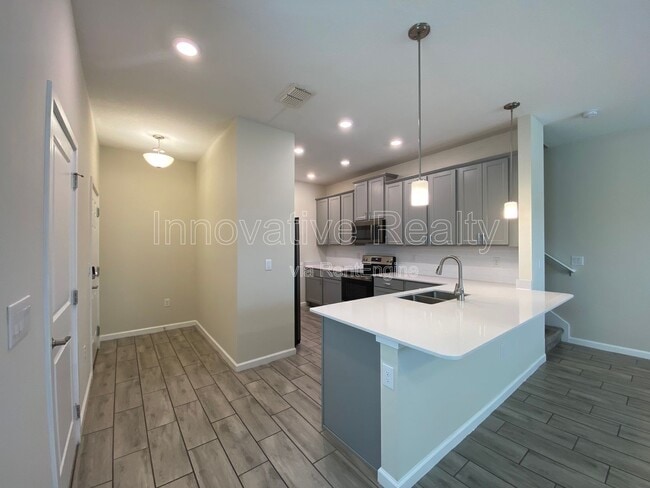 Photo - 9348 Tecumseh Dr Townhome