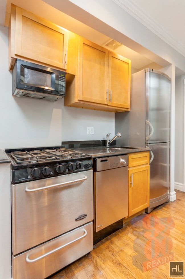 Building Photo - Bright and Updated East Village Apartment
