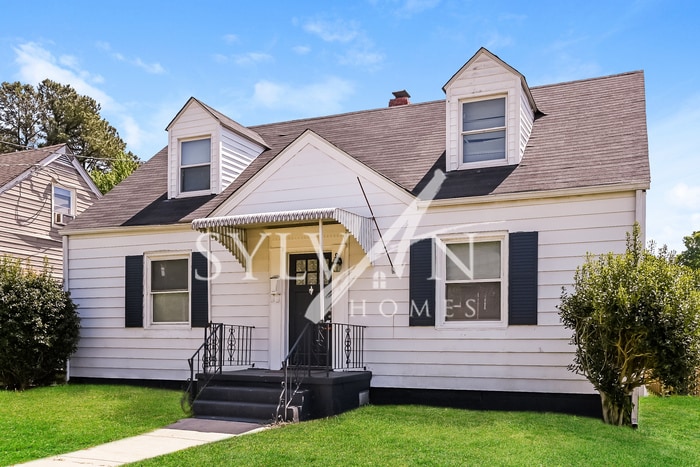 Primary Photo - The living is easy in this 4 bedroom, 1.5 ...