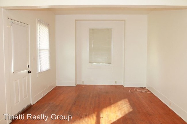 Building Photo - 2 br, 1 bath House - 115 W. 18th St.