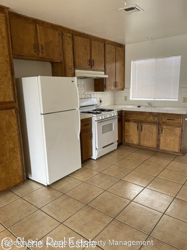 Building Photo - 2 br, 1 bath House - 6372 Smoke Tree Ave